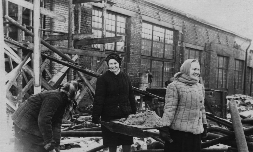 A.L. Abramova on the right, helping to clear the greenhouses ca. 1946