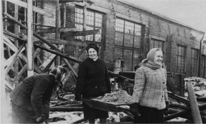 A.L. Abramova on the right, helping to clear the greenhouses ca. 1946